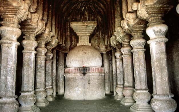 An identical design of a Buddhist shrine of two apartments is evident by a cave at Kondane where the semi-circular chamber at the back has been carved out to contain a votive chaitya 76.