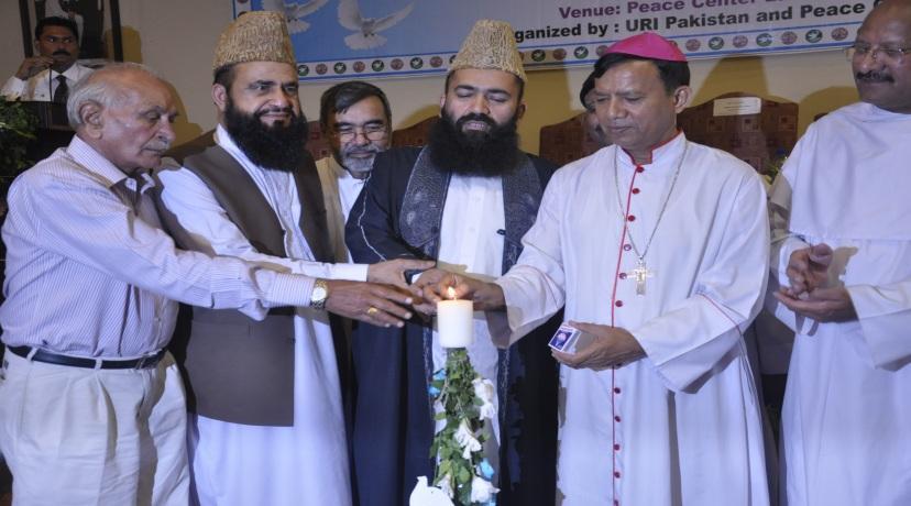Ahmad Hussain and a Christian Teacher are giving Water to the newly planted Zatoon Tree, which is very necessary for survival of new sapling to give water and it become a part of that land and the