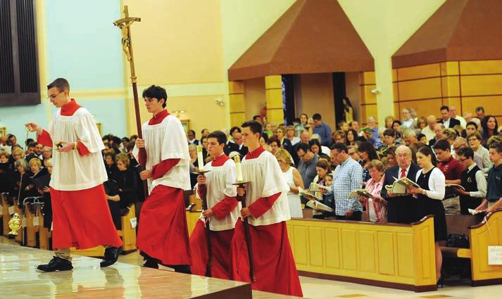 6 The A.D. Times September 21, 2017 Bishop Schlert Welcomed at First of Five Deanery Masses Altar servers lead the procession at St.