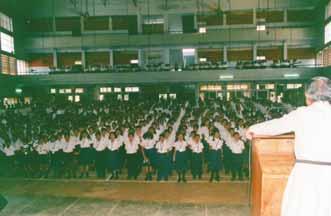 UP FRONT Auxiliary News Boys School in Bangalore. Dr. Miss E. Leelavathi Manasseh offered the opening prayer.