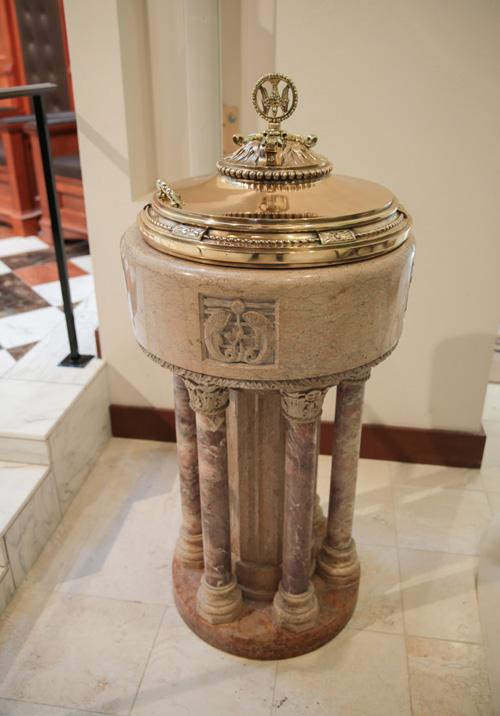 Baptismal Font The beautiful stone baptismal font was repurposed from a parish in the Archdiocese