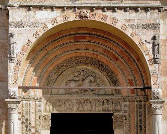 Ferrara Duomo Top of West door. Below the tympanum is a fine lintel that is supported by two Atlantes.