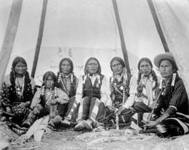 Jicarilla Apache woman, boy and men seated inside a tepee, 1898 Jicarilla Apache Nation -- http://jicarillaonline.
