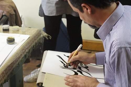 TEHRAN CONVERSATION WITH CALLIGRAPHER MASTER AMOUZAD The final appointment in Tehran was a private meeting and demonstration by Calligrapher Master Amouzad.