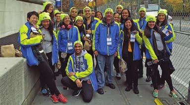 GNYC youth one of the largest volunteer groups for the 2015 annual TCS New York City Marathon were out in force.
