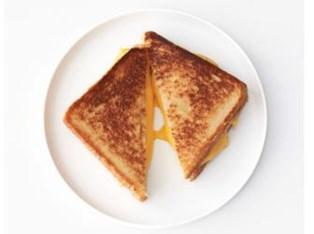 P A G E 20 Tasty Bites How to make grilled Cheese Sandwich: 1. Heat 1 tablespoon salted butter in a cast-iron or nonstick skillet over medium-low heat. 2. Press the sandwich slightly and place it in the skillet.
