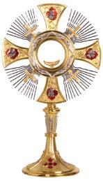 MONSTRANCE A sacred vessel designed to expose the consecrated Host to the congregation either for adoration in church or carrying in solemn