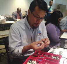 He is developing and implementing the STEM program in the conference s five schools: Staff members from the Lake Nelson school work with LEGO Robotics.
