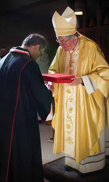 Cardinal Presides at St. John Baptist Mass and is feted at Celebratory Dinner By John J.F.