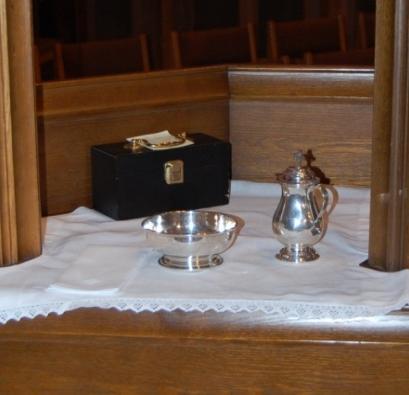 At that time, both senior and junior acolytes can enter the Sanctuary. (Don t precede the Deacon!) 1. Junior Acolyte The junior acolyte should now prepare for the lavabo at the credence. (Figure 26).