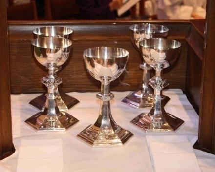 If the Deacon does not come back for them, just put them on the corner of the altar next to the chalices. Return to the side of the altar facing the senior acolyte. 2.