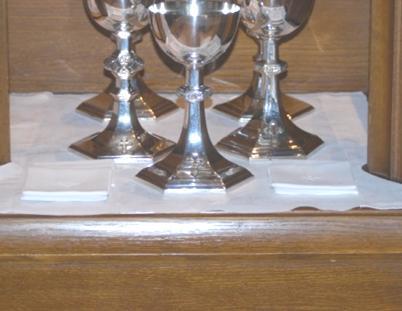 At the 8:45am and 11:15am services there will be four patens on the credence table. Purificator A white linen cloth used to wipe the Chalice during the administration of communion.