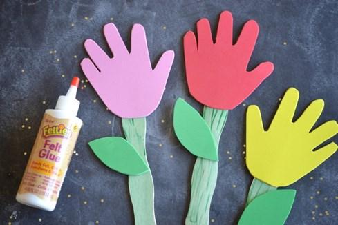 While the paint is drying, go ahead and trace your child s hands on the desired color of