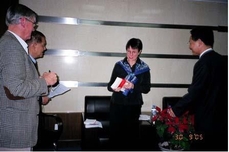 westerners in Lanzhou. Anne and Lanzhou archivists exchanged gifts of information at 2005. (Courtesy of A.