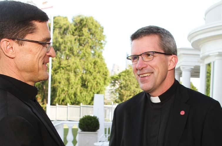 Fr. Mike Bayard, SJ, (right) with Provincial Fr. Scott Santarosa, SJ Jesuit Profile THE SURPRISING JOURNEY OF FR.