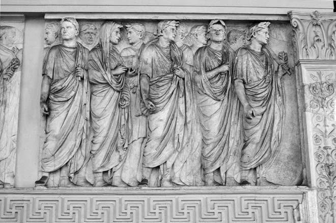 JULIUS CAESAR Figure 1.1 A group of Roman senators of the first century bc, from the Ara Pacis (Altar of Peace), completed in 12 bc. (C. M.