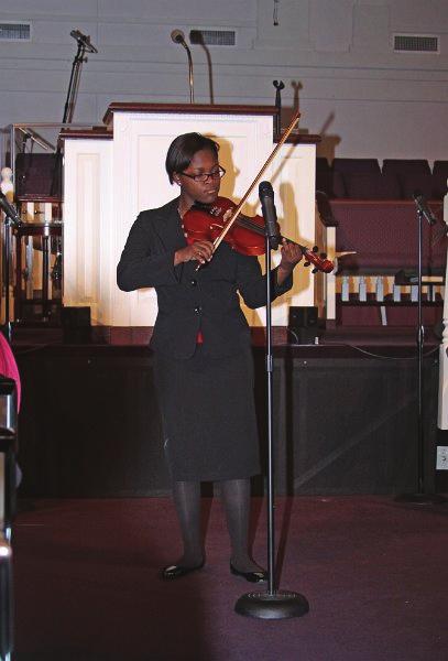 Cynthia Urquhart and Erichka Shadburn led everyone in prayer and the reading of scripture.