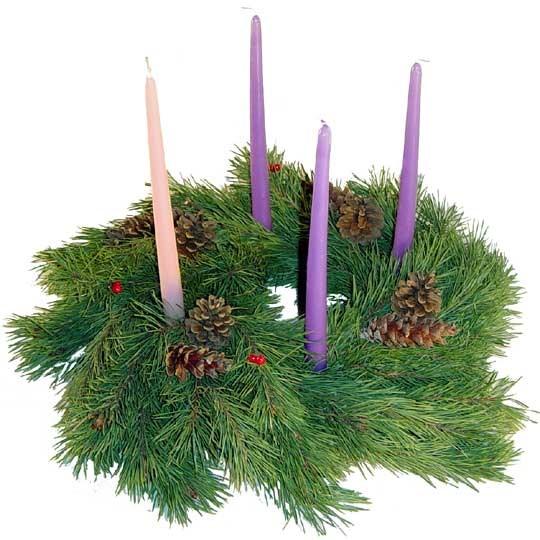 The Advent wreath is a symbolic way of preparing for Christ s coming among us.