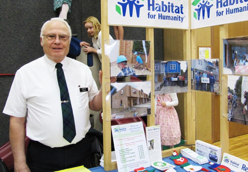 Valley Scrapbook Chuck Falconer in front of the Habitat for