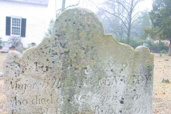 The large white headstone reads: In Memory of Major William Kennedy, who died of the wounds he received from a Robber on the fifth Day of Sept in the Year of Our Lord 1785 in the 40 th year of his