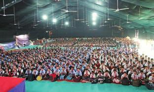 Schoolchildren absorbed during a presentation in an exhibition hall Visitors at the Nityanand hall Swami Maharaj s great life and Herculean services to society and BAPS. 7.