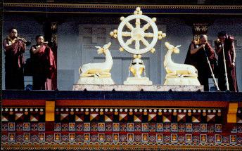 Golden Deer and Dharma Wheel statues found on the temple of Dakshang Kagyu Ling in France Footprint of the Buddha.