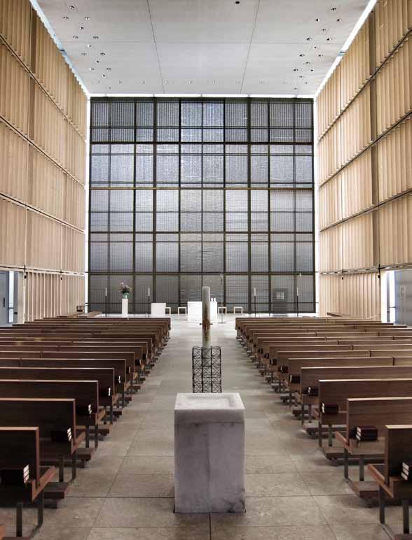 HERZ JESU MUNICH. The church is singular and modern in form with an intentional desire to create a strong contrast with the surroundings.