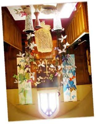 We used banners as a backdrop and then strung butterflies from the ceiling so that we would indeed be surrounded by a cloud of witnesses/butterflies. Worshipers were given two small butterflies.