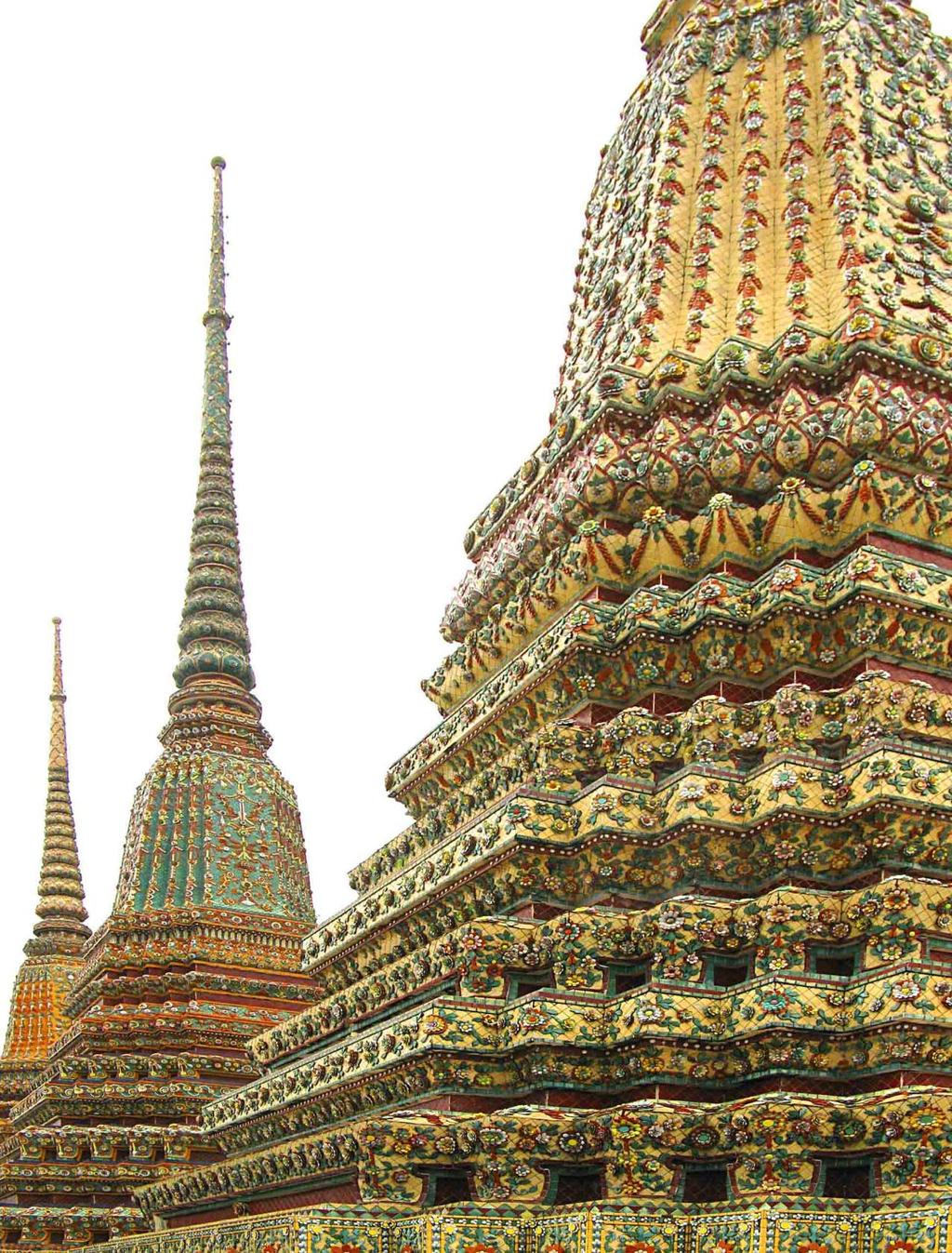 There are some 95 chedis (stupas, pagodas) of various sizes at Wat Pho, incredibly decorated with millions of colorful ceramic tiles of various sizes and