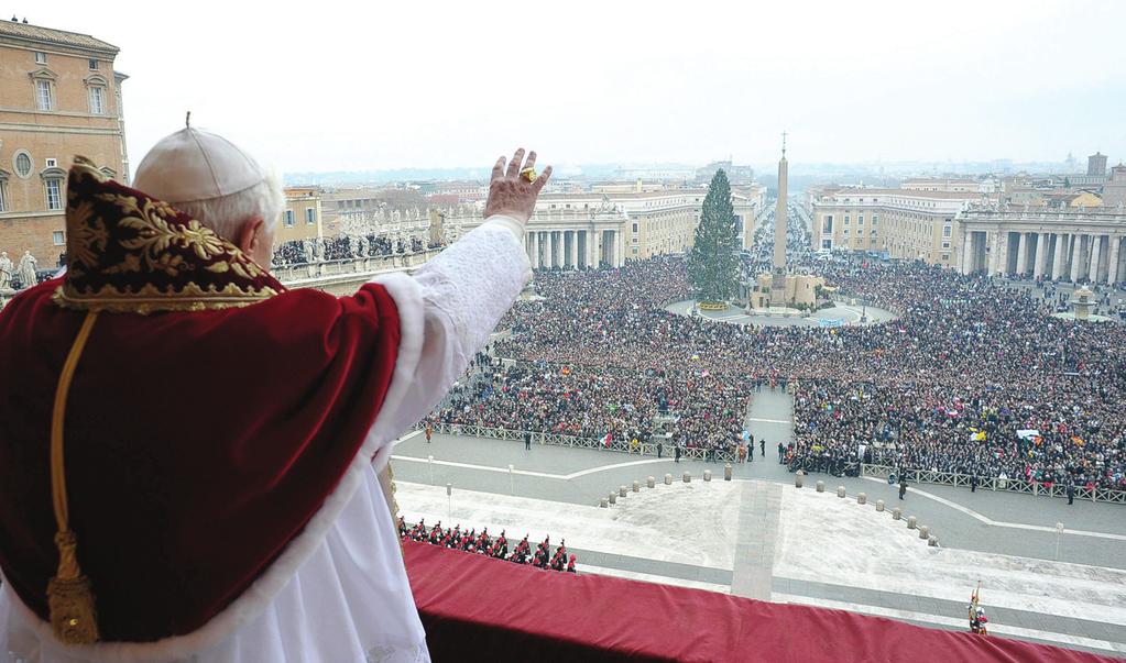 CNS PHOTO/L OSSERVATORE ROMANO VIA REUTERS In a 2008 photo, Pope Benedict XVI blesses pilgrims from the central balcony of St.