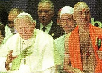 The Heresies of John Paul II 183 The Pan-Christian Encounter: John Paul II s Apostate Prayer Meeting in 1999 Pictured above is John Paul II, surrounded by an assorted group of pagans and idolaters,
