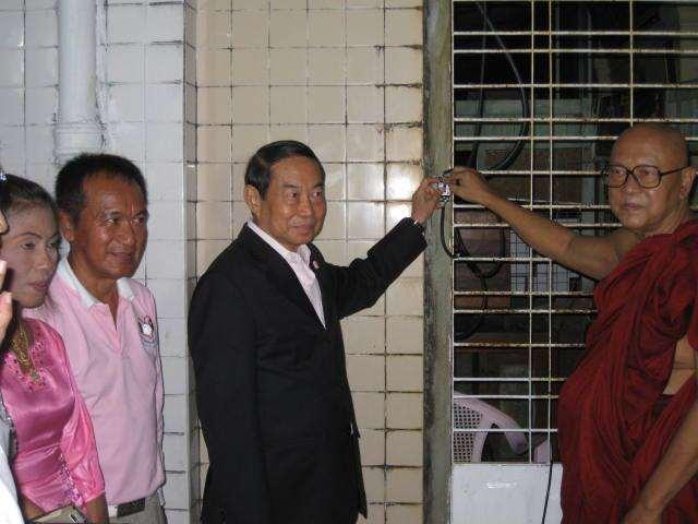 Picture 13: General Chetta Thanajaro [the Man in the black suit the photo], the former- Commander of Royal Thai Army, and the Chairman of Thai-Myanmar Cultural and Economic Cooperation Association,