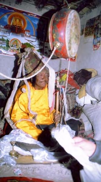 P2: Karma rig- dzin as the god bdud-btsan dmar-po receiving an offering