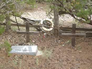 surrounded by a worn down wooden low fence were the graves of the two gunfighters from so long ago. I wandered among the graves and looked for anything that might have been a marker for Bernstein.