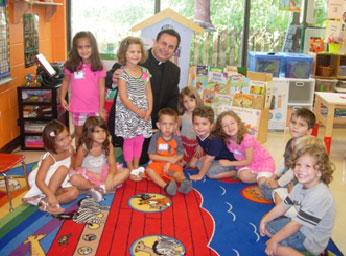 AGAPE PRESCHOOL Father Jim with the Apostle Class The Agape Preschool is now in