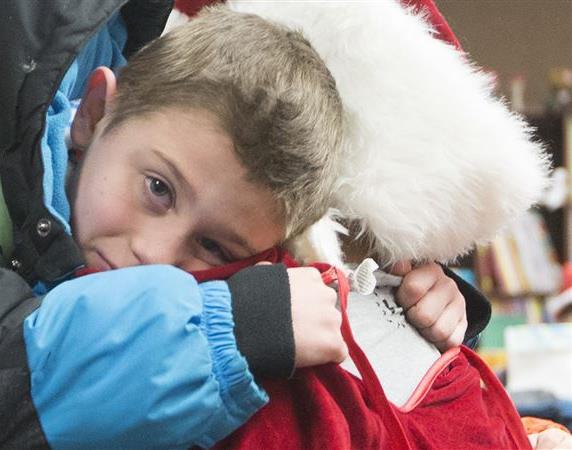 Terminally ill boy, five, dies in arms of Father Christmas Reported by Harriet Alexander in New York A terminally ill boy in Tennessee has died in the arms of Father Christmas having said that his