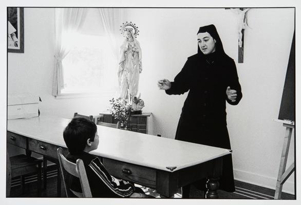 Shawinigan, Québec (projet Prieuré Saint-Pie-X), série «Petits projets», in which a nun is teaching a young child, Sylvain, the basic tenets of Roman Catholicism. Fig. 1.