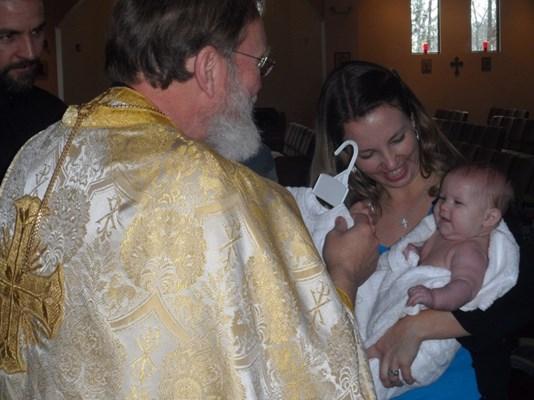 Clothing of the Baby after baptism of Immersion CLOTHING WITH THE WHITE GARMENT 99. The celebrant says: N., you have become a new creation, and have clothed yourself in Christ.