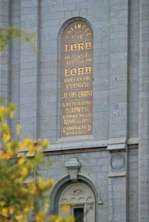 Salt Lake Temple inscriptional plaque with the all-seeing eye in the window arch below. Paul Killpack. IRI.
