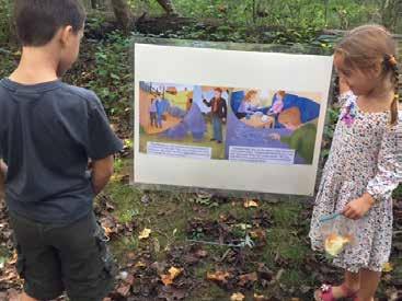 Storyboards Greet Walkers Enroute to Tashlich Enlarged and enhanced pages from the book Tashlich at Turtle Rock greeted congregants along the Rock Creek Park trail leading to the synagogue s tashlich