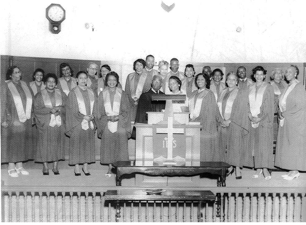 Choir from First Church Portland circa 1948-49 Front Row: Mrs. Ethel Turner (Choir/Music Director); Mrs. Lillie Williams; Mrs. Effie Ray; Mrs. Jewell Ferguson,; Rev. Lloyd W. McCoy (Pastor), Rev.