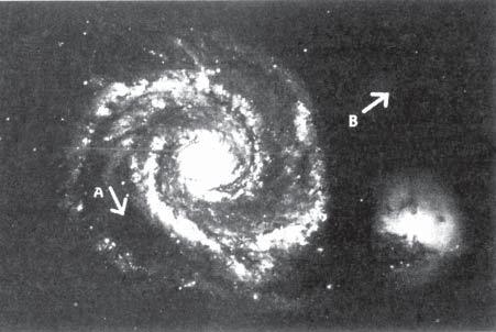 Spirals in Space Fig. 2-35. Spiral Galaxy This next photo is a little closer and more familiar to us [Fig. 2-35].