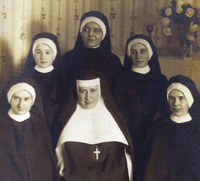 First Novitiate group in June, 1913 [Not all those in this photo can be identified, but of the three at