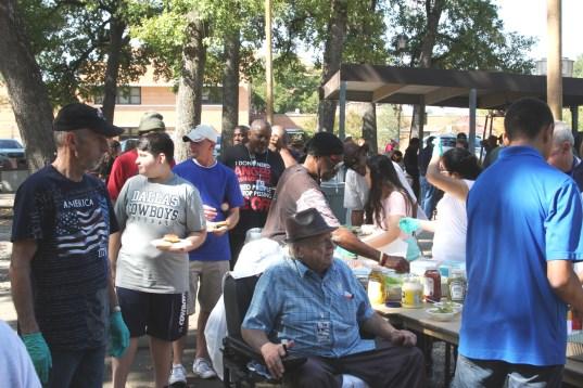 About 125 hospital patients, nursing home residents, and hospital staff were served hamburgers, hot dogs, beans, fruit, cake, cookies, donuts, home made ice cream, and sundry other items.
