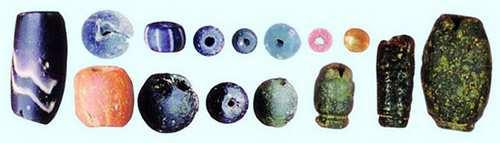 6: Glass Beads, Photo: Banglapedia 2006 Figure 7: Punch-Marked Coins, Photo: