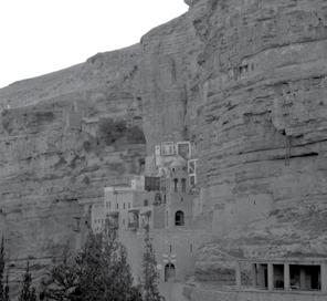 ILLUSTRATOR PHOTO/ MICAH KANDROS (61/8/22) A Greek Orthodox monastery on the side of Mount Quarantania, which overlooks ancient Jericho below.