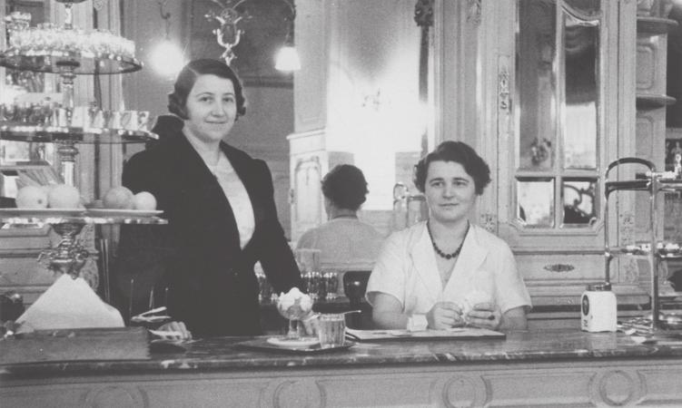 Photograph 13: Greta Mayer (22551) Greta (left) was a restaurateur and is shown here behind the counter of her coffee house in Vienna.