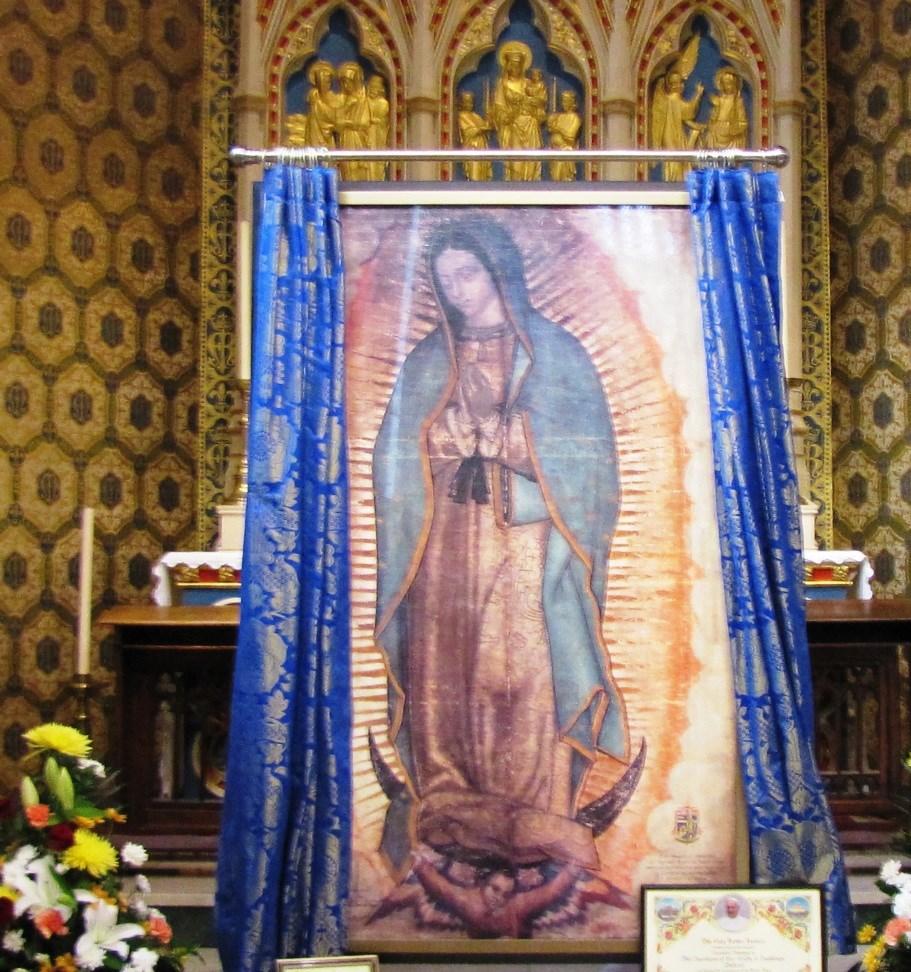 Page 9 Blue and gold for Our Lady The Guardians recently welcomed receiving new curtains for the ceremonial covering of the Miraculous Relic Image while on Pilgrimage.