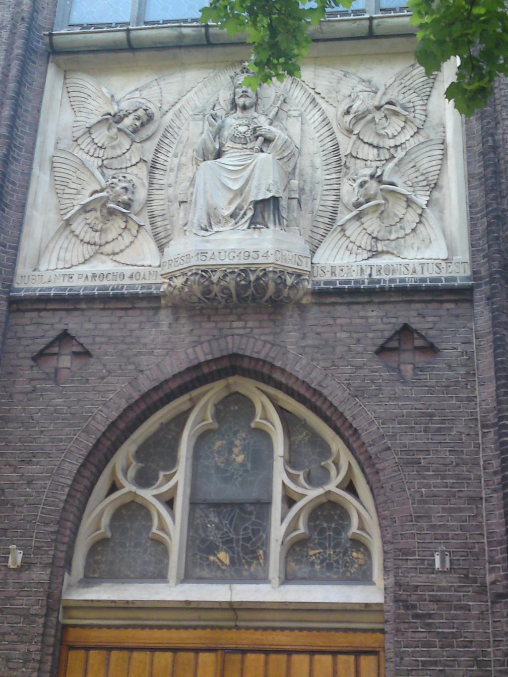 On the entrance there is a huge statue of Christ the saviour surrounded by Angels.