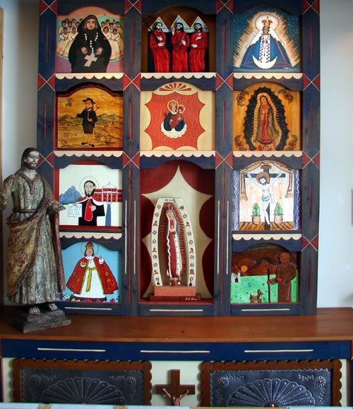 Aurora Altar Screen A Reredo is a large structure created to be placed behind altars and consisting of columns, niches, and a series of retablos